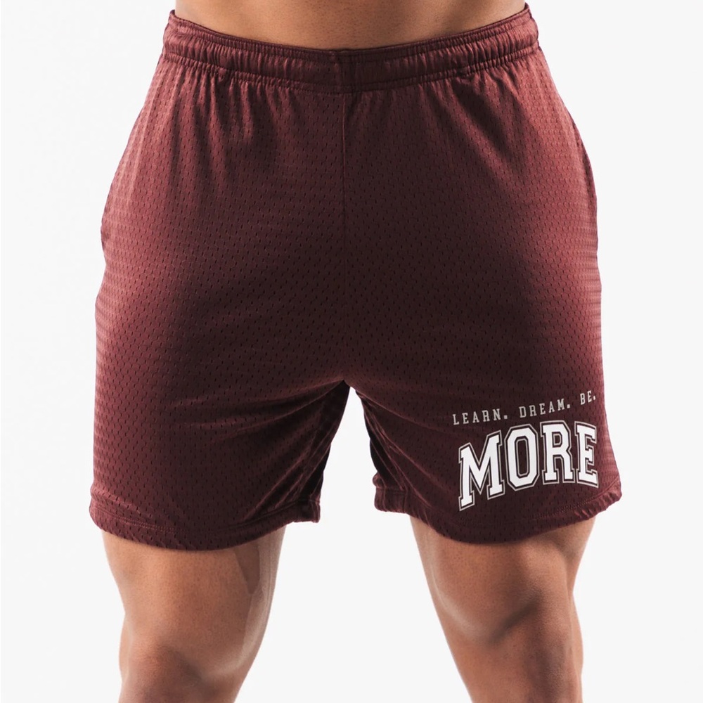 Alphalete mesh shorts in burgundy 
Unisex
